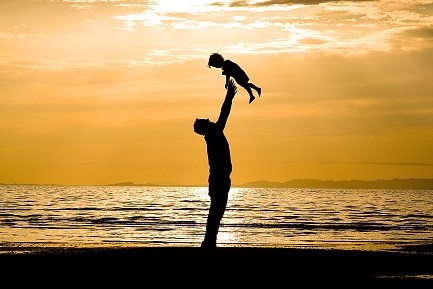 Father and son on the Beach - Silhouette Shot